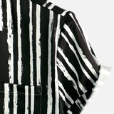 Black Hawaiian Short Sleeve Shirt with Pocket and Tropical Plant Print