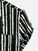 Black Hawaiian Short Sleeve Shirt with Pocket and Tropical Plant Print